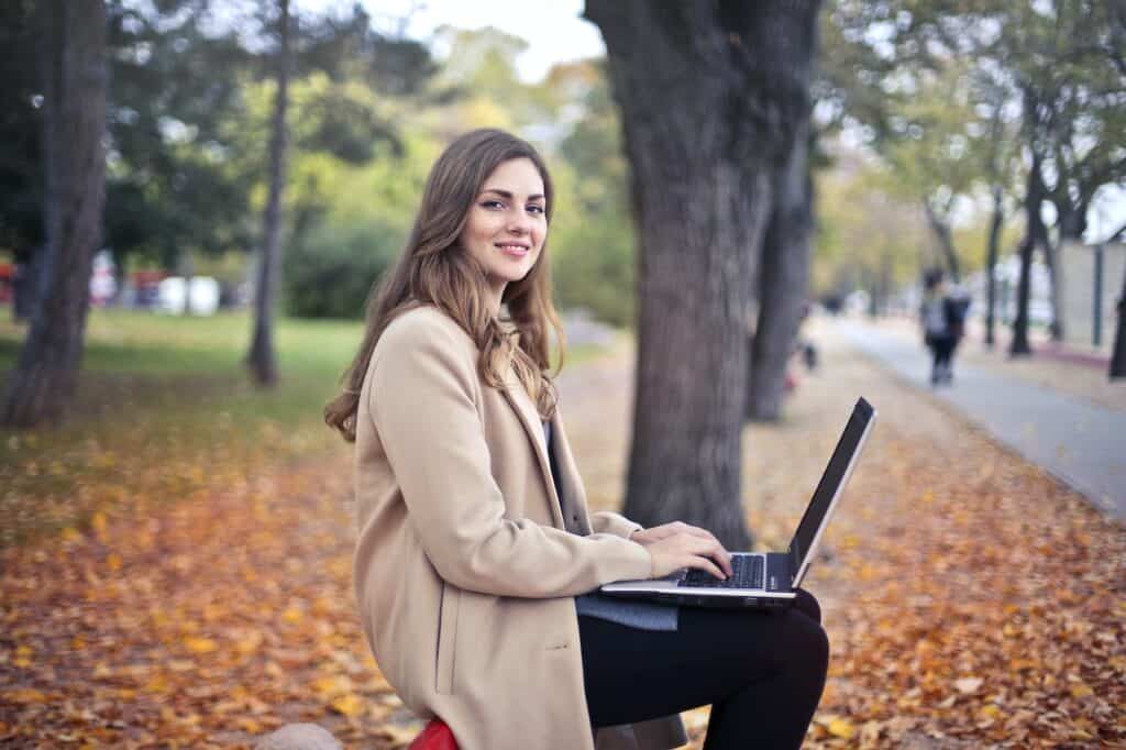 A blogger blogging outside