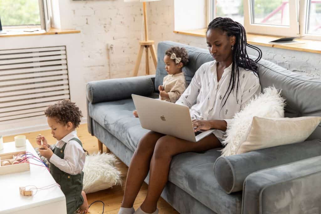 A mom working from home productively with kids while maintaining work-life balance